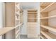 Organized walk-in closet with ample shelving and drawers for storage at 1700 Bassett St # 1111, Denver, CO 80202