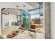 Cozy living room with stunning city views and modern furnishings at 1700 Bassett St # 1111, Denver, CO 80202