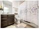 Bathroom with a single vanity and shower tub combo at 960 S De Gaulle Ct, Aurora, CO 80018
