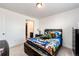 Bright bedroom with a carpeted floor and natural light at 960 S De Gaulle Ct, Aurora, CO 80018