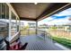 Covered porch perfect for outdoor seating and relaxation at 960 S De Gaulle Ct, Aurora, CO 80018