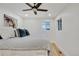 Main bedroom with hardwood floors and a ceiling fan at 1061 Elbert St, Denver, CO 80221