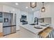 Stainless steel refrigerator in a newly remodeled kitchen at 1061 Elbert St, Denver, CO 80221