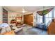 Bedroom features a ceiling fan, closet, and plenty of natural lighting at 7815 Armadillo Trl, Evergreen, CO 80439