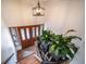 Warm entryway with wood floors, paneled doors, and natural lighting at 7815 Armadillo Trl, Evergreen, CO 80439
