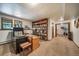 Inviting home office features built-in bookshelves and natural light, creating a comfortable workspace at 7815 Armadillo Trl, Evergreen, CO 80439