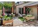 Spacious back patio with lush plantings, barbecue area, and room for outdoor dining and relaxation at 912 Oakwood Dr, Castle Rock, CO 80104