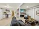 Spacious basement living room with a fireplace, wet bar and comfortable seating at 912 Oakwood Dr, Castle Rock, CO 80104