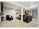 Finished basement offers a cozy living area with plush seating and stylish decor accents at 912 Oakwood Dr, Castle Rock, CO 80104