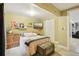 Bedroom features warm tones, ample storage, and comfortable furnishings at 912 Oakwood Dr, Castle Rock, CO 80104