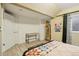 Bedroom with laminate flooring, closet, and stylish decor accents at 912 Oakwood Dr, Castle Rock, CO 80104