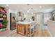 Beautiful kitchen featuring a large center island with seating, stainless steel appliances, and modern cabinetry at 912 Oakwood Dr, Castle Rock, CO 80104