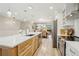 Well-appointed kitchen with a spacious island, stainless steel appliances, and an open concept design at 912 Oakwood Dr, Castle Rock, CO 80104