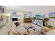 Comfortable living room with a fireplace, hardwood floors, and cozy seating at 912 Oakwood Dr, Castle Rock, CO 80104