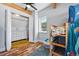 bedroom featuring a loft bed, dresser and closet offering functional space and play at 3170 W 29Th Ave, Denver, CO 80211