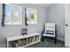 Cozy bedroom with a reading nook and large windows, creating a peaceful retreat at 3170 W 29Th Ave, Denver, CO 80211