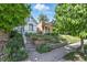 Beautifully landscaped front yard with tiered planters adds curb appeal to these lovely homes at 3170 W 29Th Ave, Denver, CO 80211