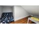 Cozy storage space or reading nook with a blue cushion and hardwood floors at 3170 W 29Th Ave, Denver, CO 80211