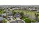 Expansive aerial view highlighting the neighborhood, surrounding landscaping, and a well maintained lawn at 16453 Homestead Ct, Parker, CO 80134
