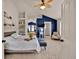 Bright and airy main bedroom with ensuite, tub, vaulted ceilings, and ample space at 16453 Homestead Ct, Parker, CO 80134