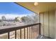 Exterior balcony overlooks parking area and streetscape at 492 Vance St, Lakewood, CO 80226