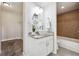 Clean bathroom with granite countertop and updated vanity at 909 N Logan St # 6K, Denver, CO 80203