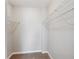 Large walk-in closet with wire shelving and hanging rods at 909 N Logan St # 6K, Denver, CO 80203