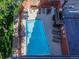 Community pool with lounge chairs and a patio area at 909 N Logan St # 6K, Denver, CO 80203