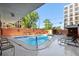 Inviting community pool with surrounding patio at 909 N Logan St # 6K, Denver, CO 80203