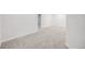 A well-lit basement featuring neutral walls and carpet, offering a flexible space for various activities at 9147 W Rockland Pl, Littleton, CO 80128