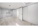 Finished basement with neutral carpeting and closet space at 9147 W Rockland Pl, Littleton, CO 80128