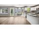 Spacious dining area adjacent to the kitchen with lots of windows and bright natural light at 9147 W Rockland Pl, Littleton, CO 80128