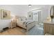 Serene main bedroom features a cozy bed, soft lighting, and calming decor at 5037 N Quemoy St, Aurora, CO 80019