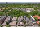 Aerial view of a residential neighborhood featuring lush greenery and tree-lined streets at 434 Clayton St, Denver, CO 80206