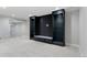 Basement featuring custom built-ins with open shelving, storage, and recessed lighting at 434 Clayton St, Denver, CO 80206