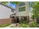 Modern home featuring unique architectural details, a well-manicured yard, and a private entrance at 434 Clayton St, Denver, CO 80206