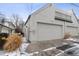 Two-car garage with a private back entry and landscaping at 434 Clayton St, Denver, CO 80206