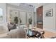 Bright living room with an open patio area and a modern fireplace at 434 Clayton St, Denver, CO 80206