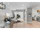 Bright living room with a modern design, fireplace, and view of the outdoor patio at 434 Clayton St, Denver, CO 80206