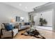 Bright living room with a modern design and a view of the landscaped backyard at 434 Clayton St, Denver, CO 80206