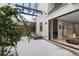 Back patio with plants, fountain, and view of the fireplace at 434 Clayton St, Denver, CO 80206