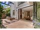 Outdoor patio with brick paving connects to the living room via sliding glass doors and provides private outdoor space at 434 Clayton St, Denver, CO 80206