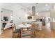 Eat-in dining area with a view of the bright, modern kitchen at 2930 W 34Th Ave, Denver, CO 80211