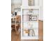 Close-up of white shelves and dining area with adjacent kitchen at 2930 W 34Th Ave, Denver, CO 80211