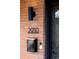 Close-up of the front door with modern mailbox, stylish numbering and doorbell at 2930 W 34Th Ave, Denver, CO 80211
