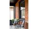 Inviting front porch with seating area for enjoying the outdoors in comfort at 2930 W 34Th Ave, Denver, CO 80211