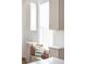 Kitchen window nook featuring white cabinetry, comfortable seating, and bright natural light at 2930 W 34Th Ave, Denver, CO 80211
