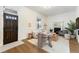 Bright, stylish living room with hardwood floors, fireplace, and natural light at 2930 W 34Th Ave, Denver, CO 80211