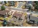 A bird's eye view shows a neighborhood with tree lined streets and well manicured lawns at 17085 E Dorado Cir, Centennial, CO 80015