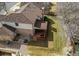 Aerial view of the property with a well-manicured lawn, patio, and deck, showcasing the outdoor living spaces at 17085 E Dorado Cir, Centennial, CO 80015
